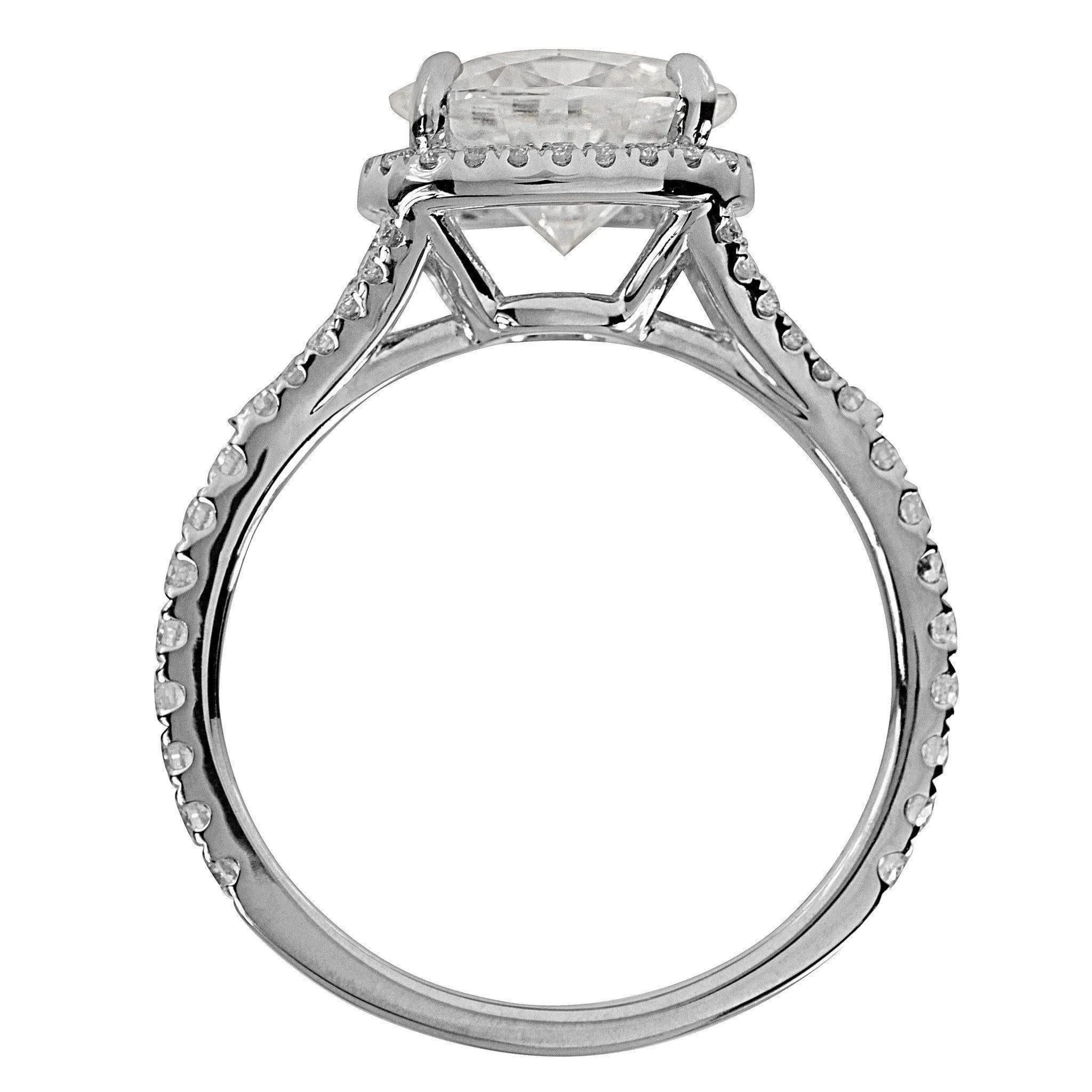 9x7mm Oval Center 14K White Gold Diamond East to West Diamond Halo Basket Design Ring