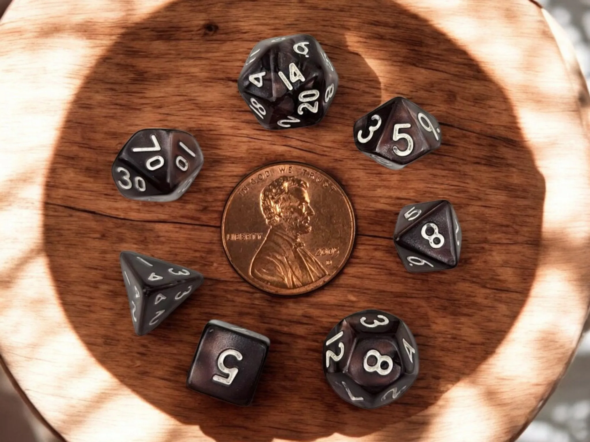 Mini drawstring bag with a set of mini dice, brown dice