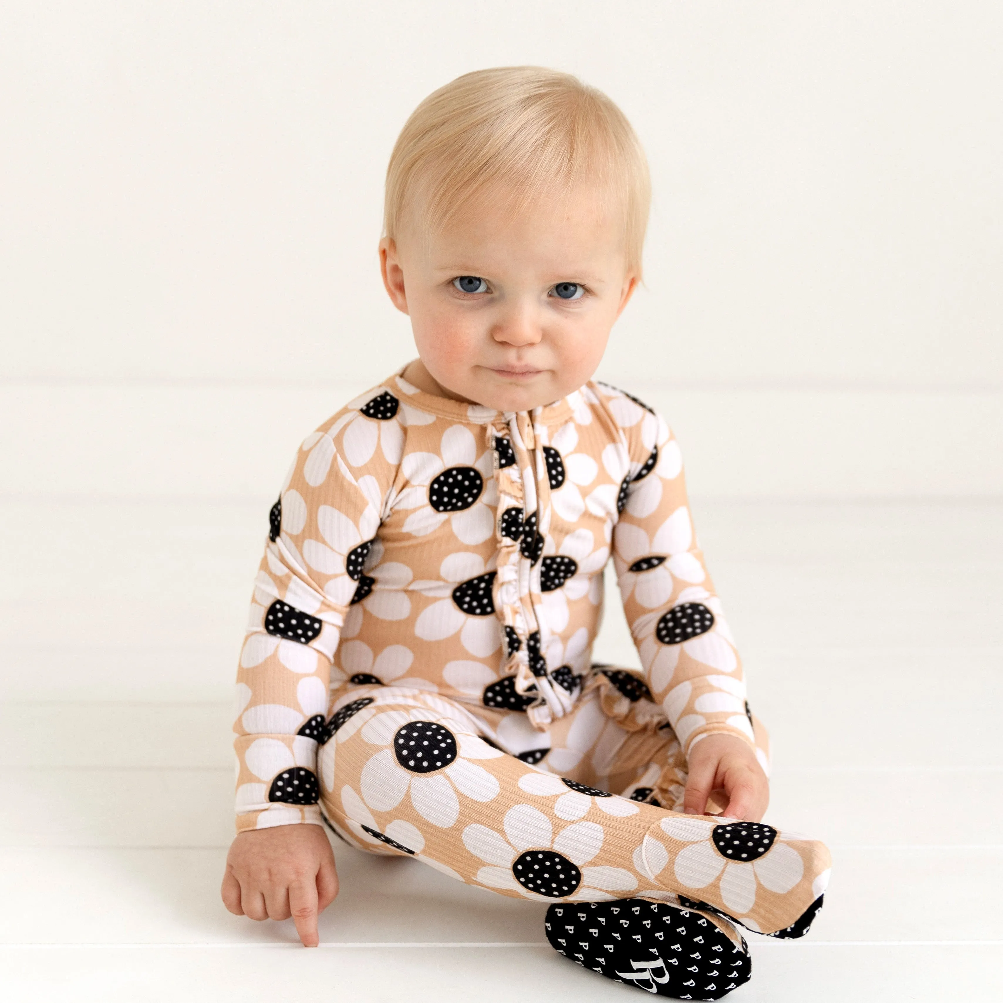 Posh Peanut Reagan Ruffled Zippered Footie