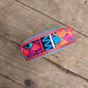 The Sofia (red with blue padding)